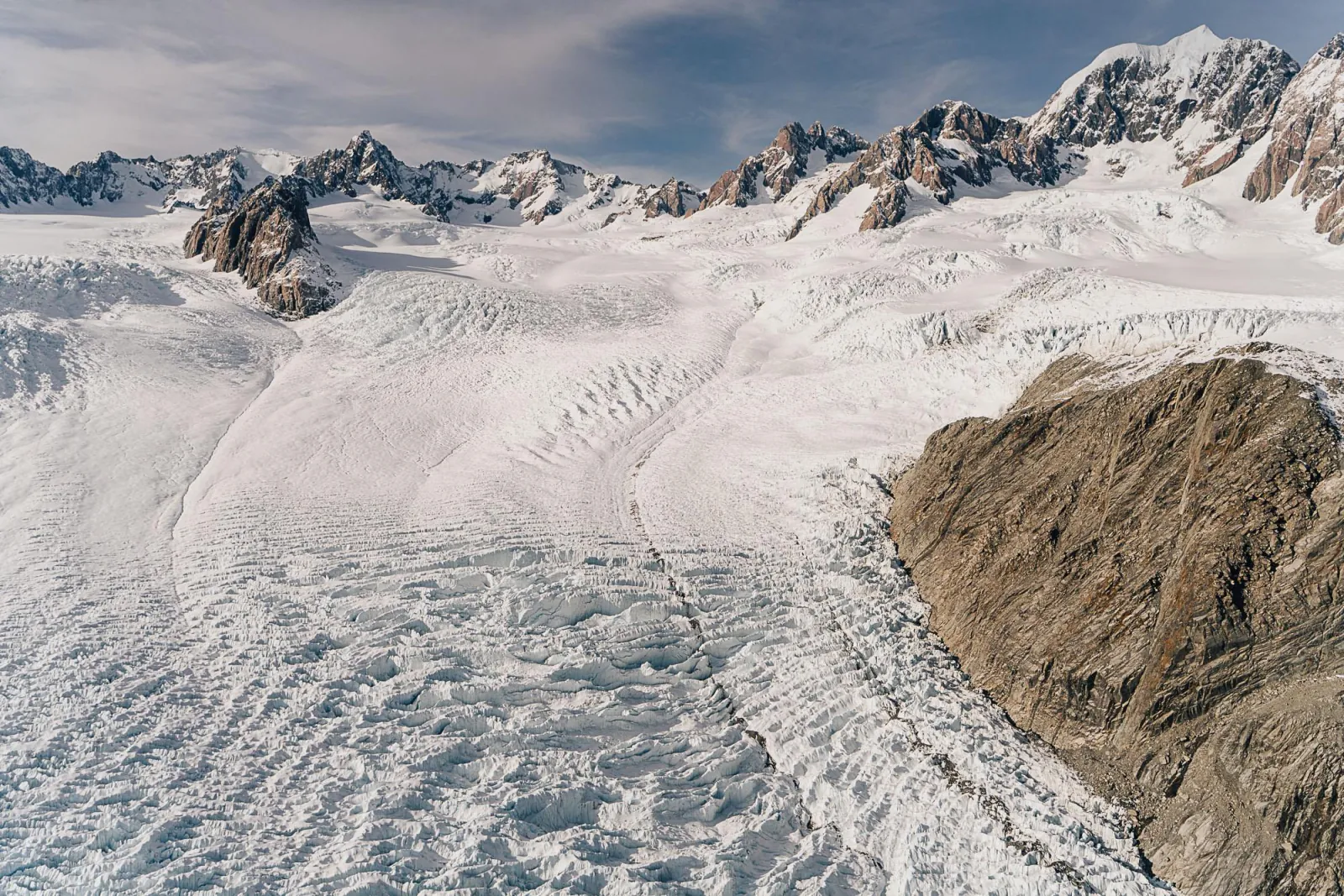 Broad glacier and icefalls below the rocky peaks of the Main Divide